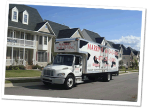 Marrin's Moving truck driving down the road to a new destination in North Carolina 