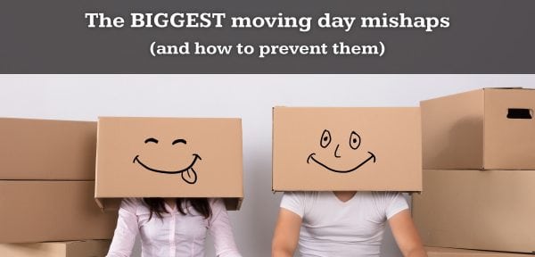 A man and a woman wearing cardboard boxes with a happy faces with moving boxes surrounding them